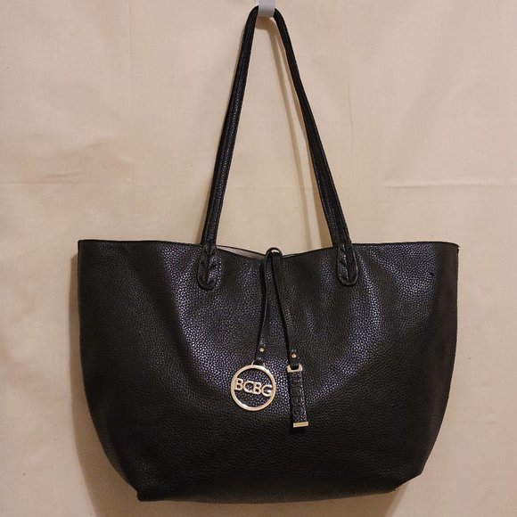 BCBG Handbags - !!!SOLD!!! BCBG Paris Reversible (black/white) Tote